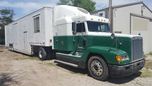 1997 Freightliner-Cat-10spd-SLEEPER w/ 44' Lift Door Stacker 